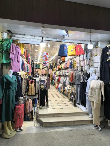 عکس فروشگاه پوشاک ماه (حاج حسن جاودانی) تاسیس ۱۳۴۱