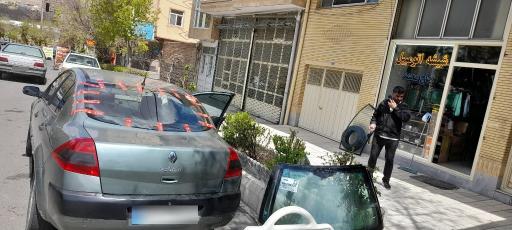 عکس شیشه اتومبیل حاج محمد