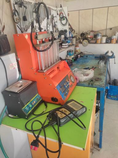 عکس تنظیم موتور و برق خودرو واحد