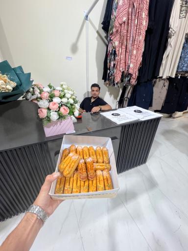 عکس فروشگاه پوشاک خانواده شاملو