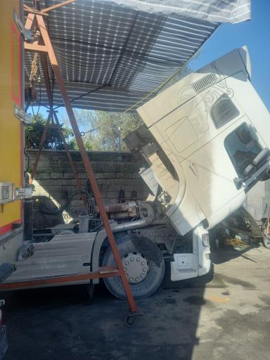 عکس تعمیرگاه دانگ فنگ و فوتون کیان