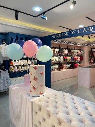 عکس فروشگاه لباس  اینفینیتی 