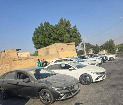 عکس نمایشگاه اتومبیل برادران خدادادزاده
