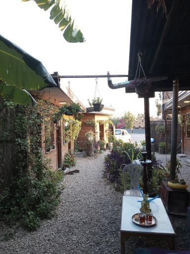 عکس کافه رستوران کلبه چوبی