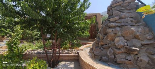 عکس اقامتگاه بومگردی سفره ایرانی باپذیرایی