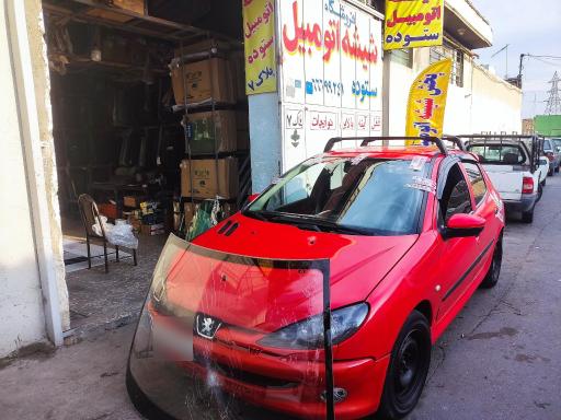 عکس فروشگاه بزرگ شیشه اتومبیل ستوده