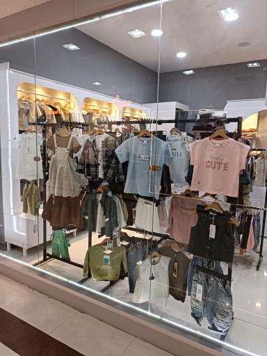 عکس پوشاک بچگانه هپی هیپو