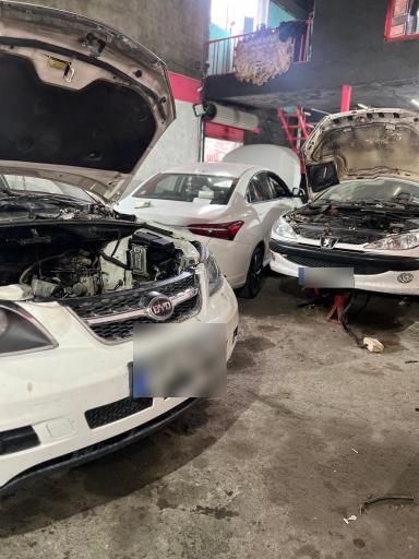 عکس تعمیرگاه موتور و گیربکس و جلوبندی صادقی و داستانی