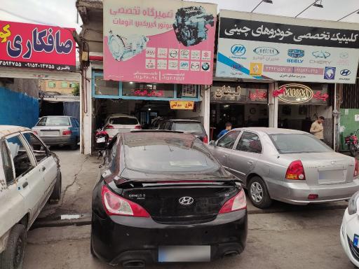 عکس تعمیرگاه موتور و گیربکس و جلوبندی صادقی و داستانی