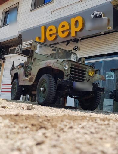 عکس فروشگاه قطعات جیپ کاام