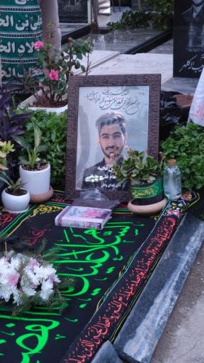 عکس مزار شهیدجنگ‌ رمضان شهید علی رمضانی