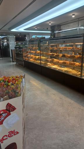 عکس قنادی لادن