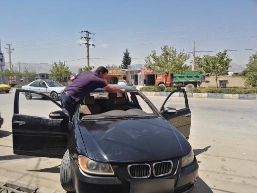 عکس شیشه اتومبیل امیر 