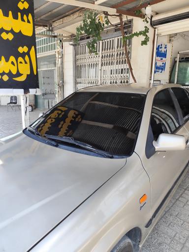 عکس شیشه اتومبیل امیر 
