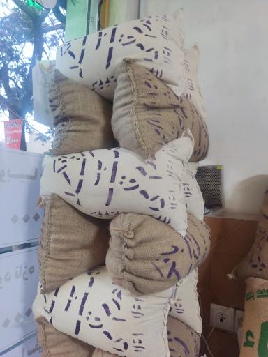 عکس بازرگانی برنج و حبوبات بادامچی 