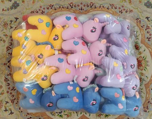 عکس فروشگاه عروسک واسباب بازی