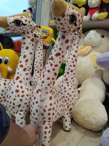 عکس فروشگاه عروسک واسباب بازی