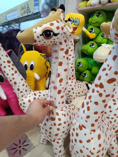 عکس فروشگاه عروسک واسباب بازی