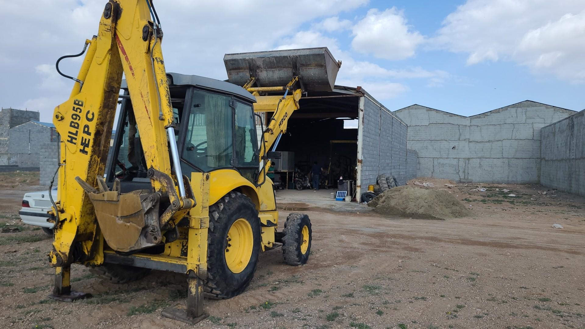 عکس تعمیرات بیل بکهو فتاحی