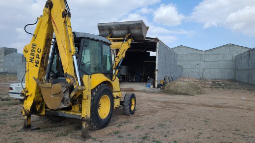 عکس تعمیرات بیل بکهو فتاحی