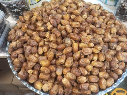 عکس خرما و ترشیجات کاج