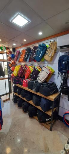 عکس فروشگاه ورزشی 23