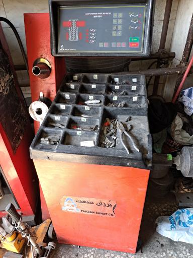 عکس لاستیک فروشی و پنچرگیری خوشبخت