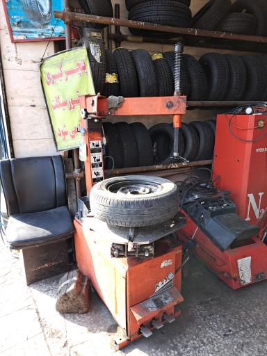 عکس لاستیک فروشی و پنچرگیری خوشبخت