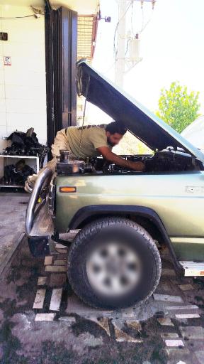 عکس مکانیکی حمید حسامی