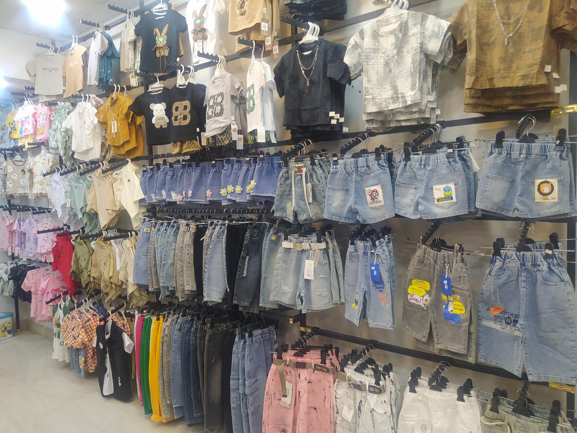 عکس پوشاک بچگانه توتیا 