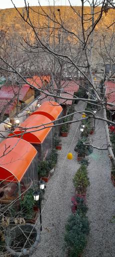 عکس باغ رستوران کلبه