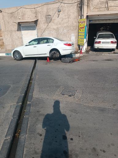 عکس تعمیر جلوبندی و کمک فنر حسین