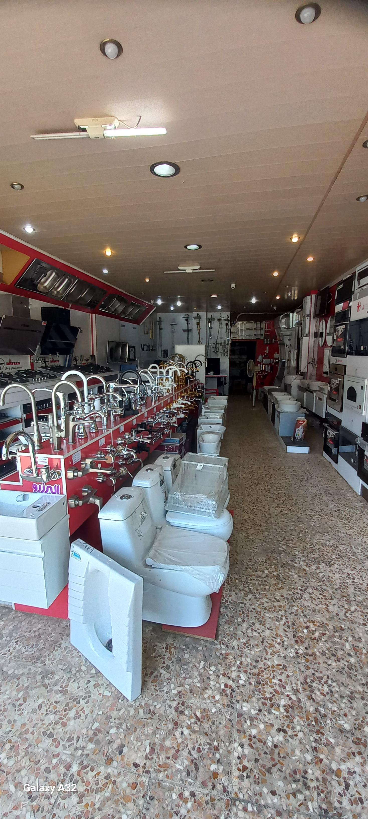 عکس فروشگاه مهاجرانی