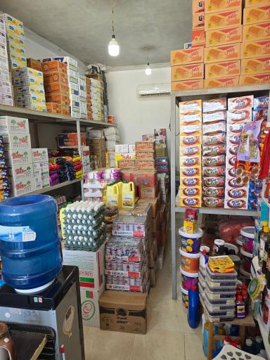 عکس عمده فروشی مواد غذایی طولا
