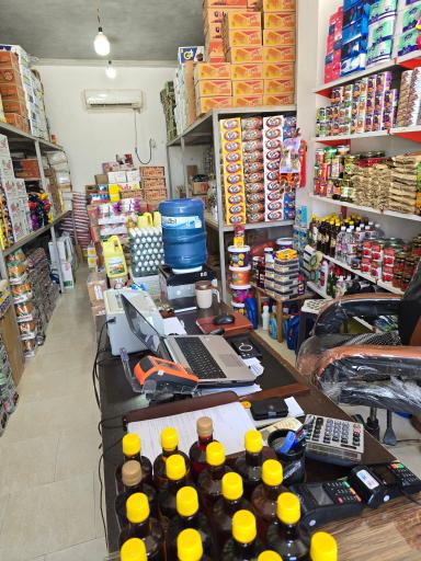عکس عمده فروشی مواد غذایی طولا