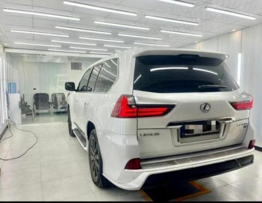 عکس کارشناسی تشخیص رنگ و فنی خودرو رضایی