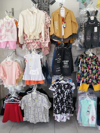 عکس پوشاک بچگانه و زنانه ماندی مُد