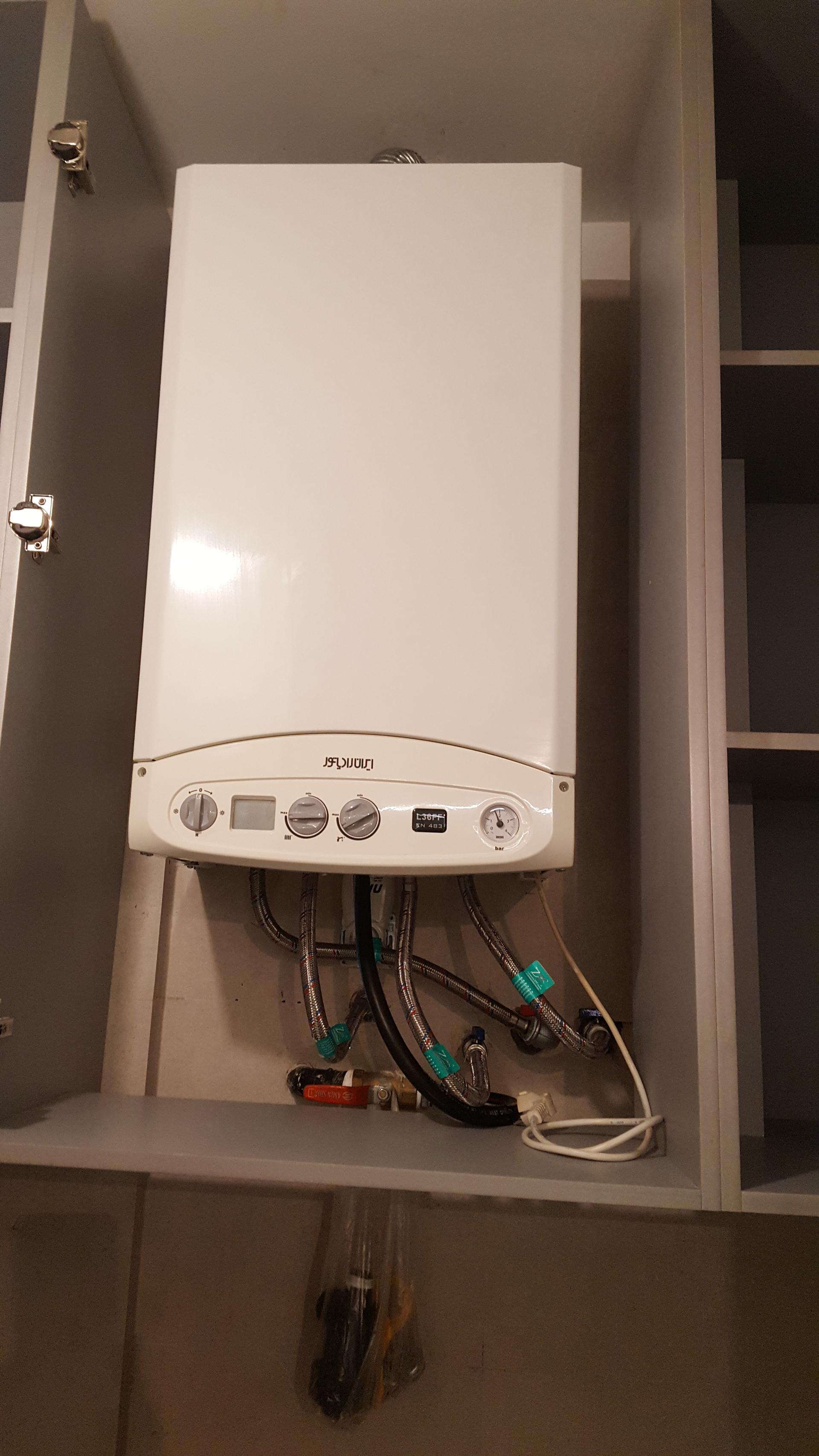 عکس تعمیرات پکیج استاکار