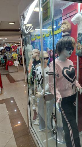 عکس فروشگاه بچگانه ریزوتین