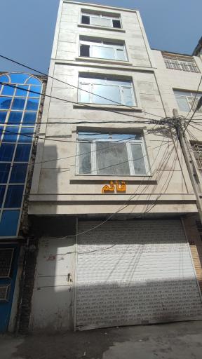 عکس ساختمان مسکونی قائم