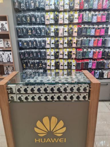 عکس فروشگاه لوازم جانبی موبایل قاب فادر