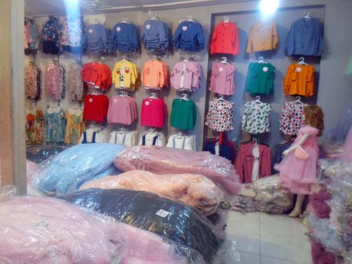 عکس تولید و پخش پوشاک لباس بچگانه زیگ زاگ