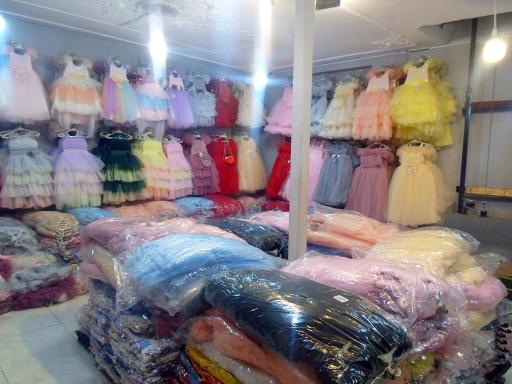 عکس تولید و پخش پوشاک لباس بچگانه زیگ زاگ