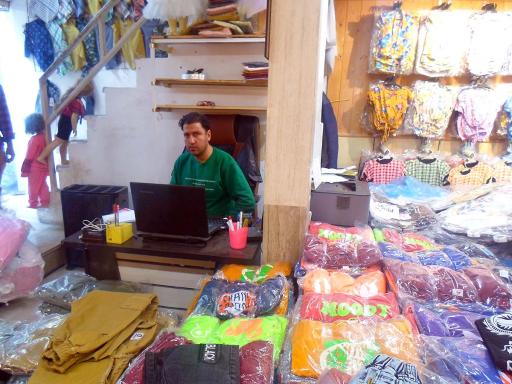 عکس تولید و پخش پوشاک لباس بچگانه زیگ زاگ