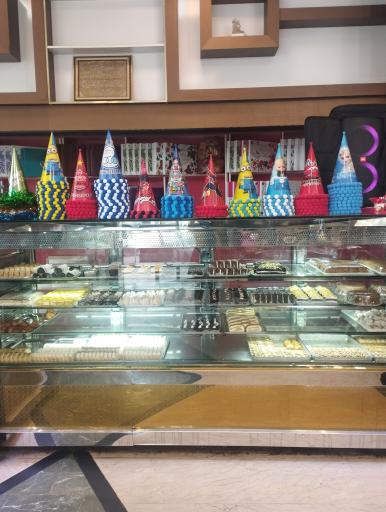 عکس شیرینی سرای کاملیا