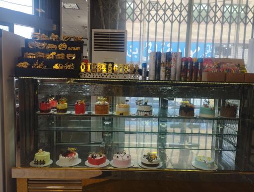 عکس شیرینی سرای کاملیا