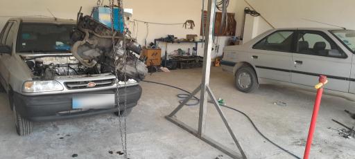 عکس تعمیرگاه اتومبیل ایمان