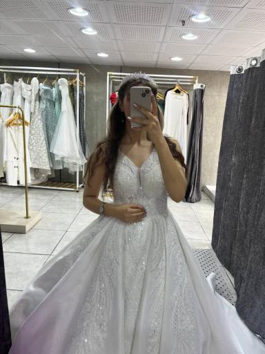 عکس کرایه لباس عروس مانلی 