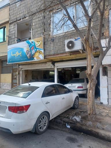 عکس تعمیرگاه تخصصی اتومبیل پویا