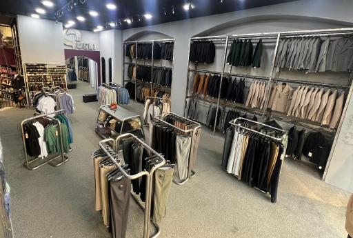 عکس فروشگاه کفش و لباس کوئلی شاپ